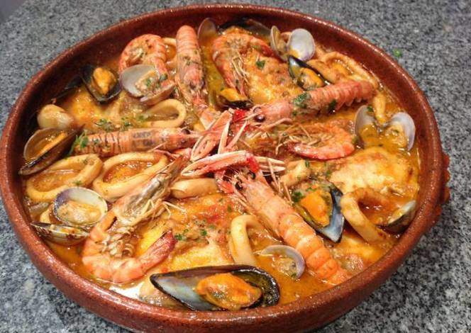 Merluza con Gambas y Mariscos - Heek met schelpdieren en garnalen